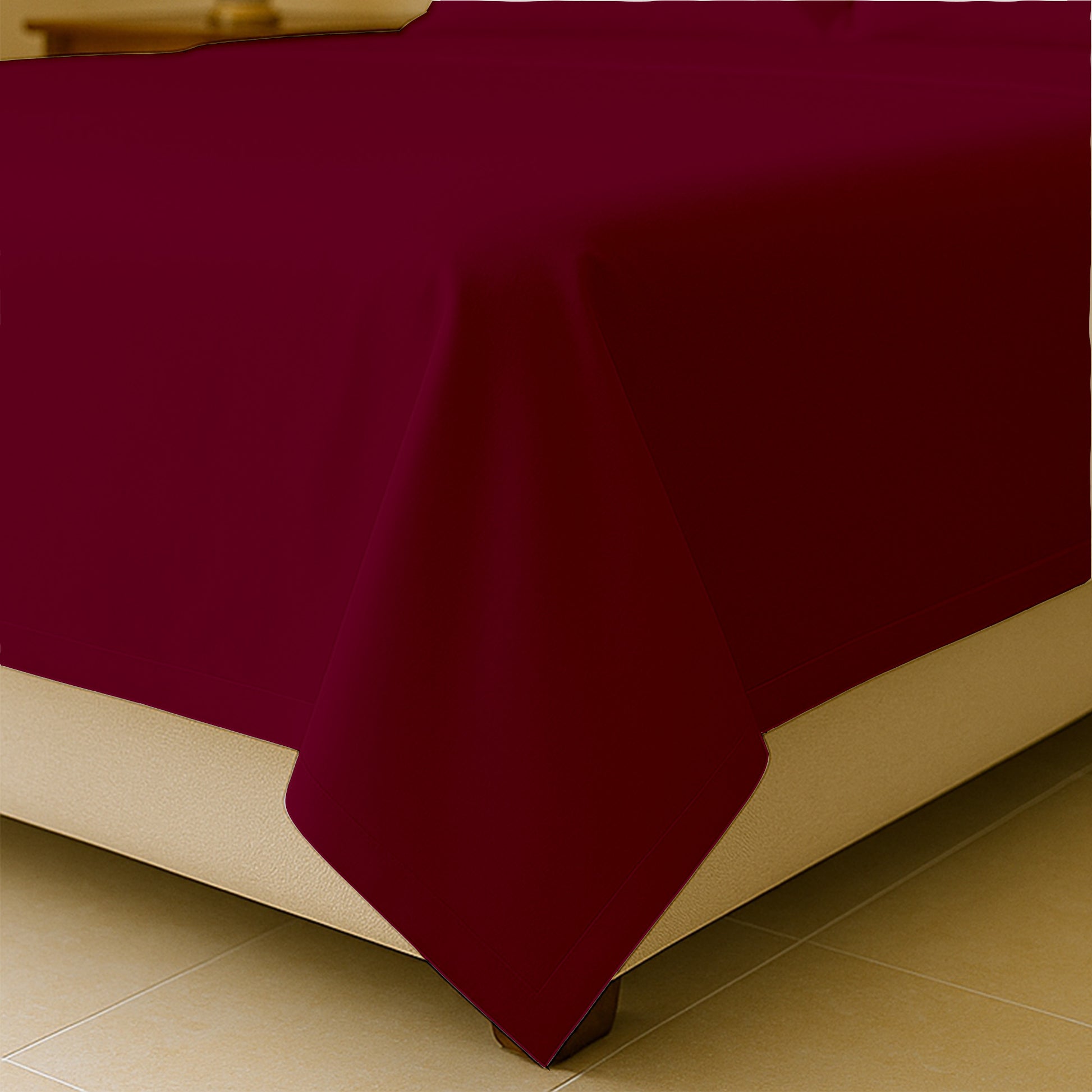 King size flat sheet spread across mattress